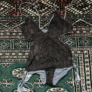 Acacia reversible navy lines and animal print one piece swimsuit